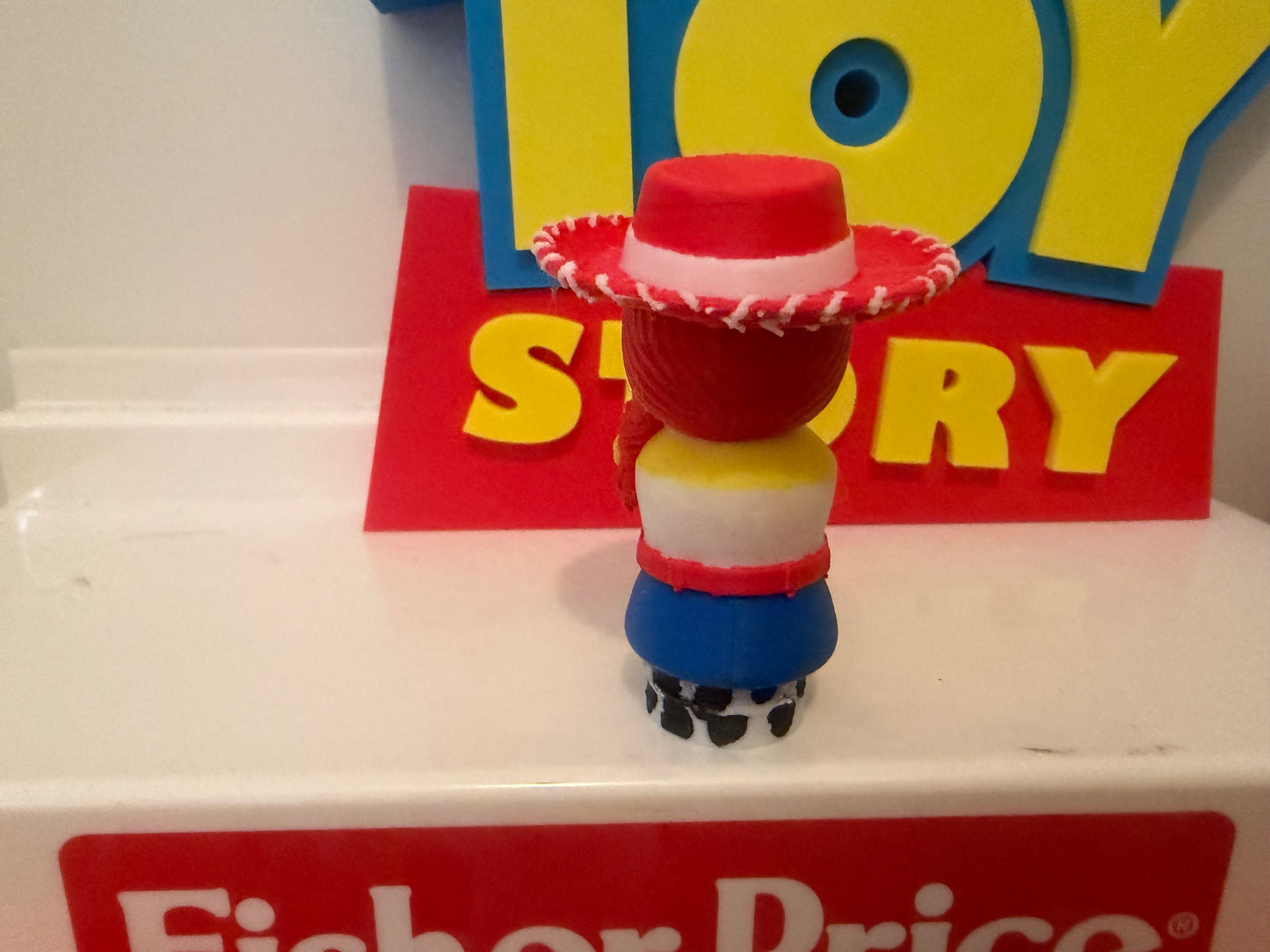 Custom Jessie-inspired collectible figure with red cowboy hat and blue skirt