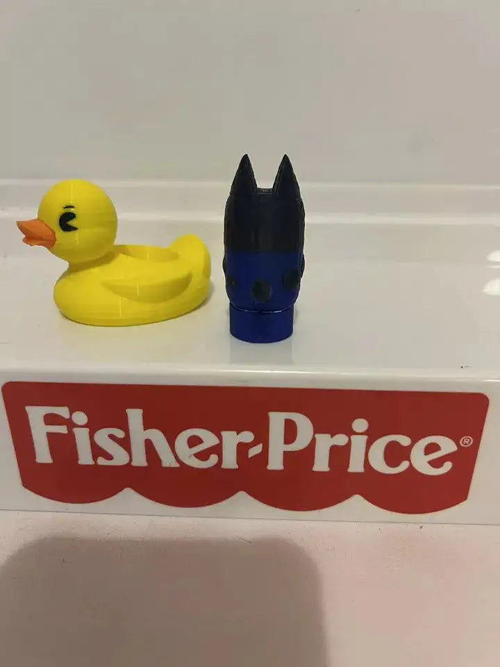 Bluey plush hand puppet and yellow duck toy, viewed from back