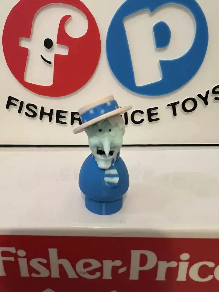 A custom 3D printed Fisher-Price Little People Snow Miser figure stands against a backdrop of Fisher-Price logos.