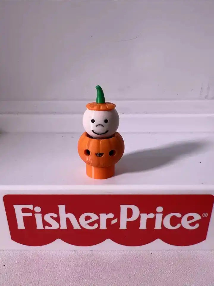 This custom 3D printed Fisher-Price Little People Halloween Pumpkin Boy figure stands on a white surface with the brand logo.