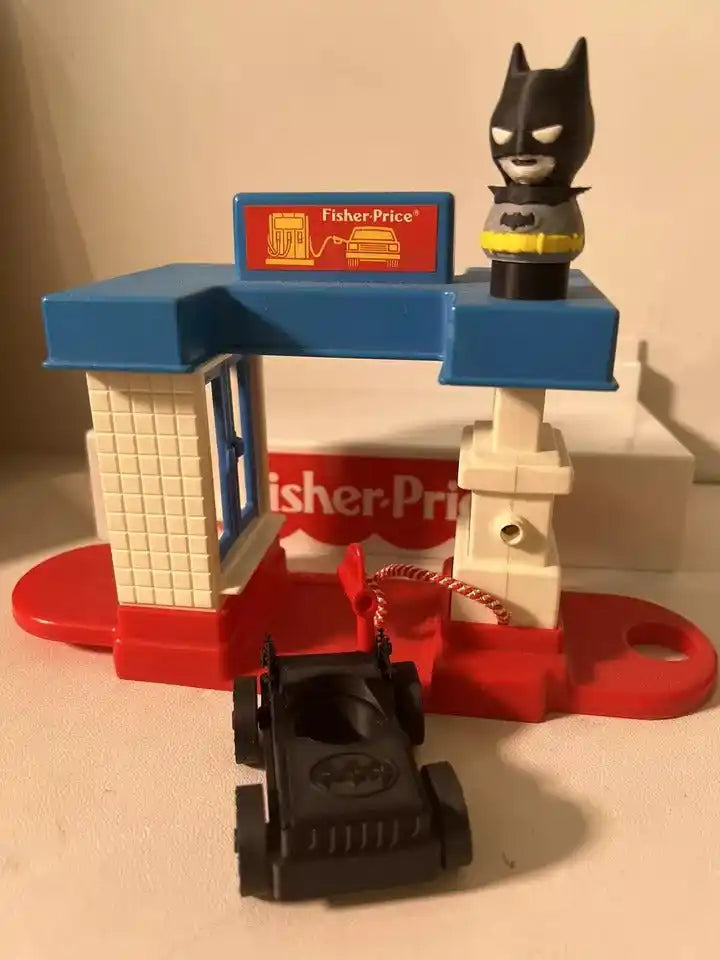 Batman mini figure, black suit with yellow belt and cape detail