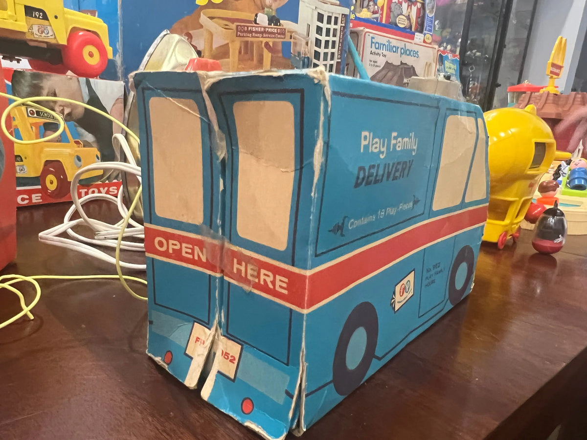 Blue play delivery van toy box with open panel and OPEN HERE label