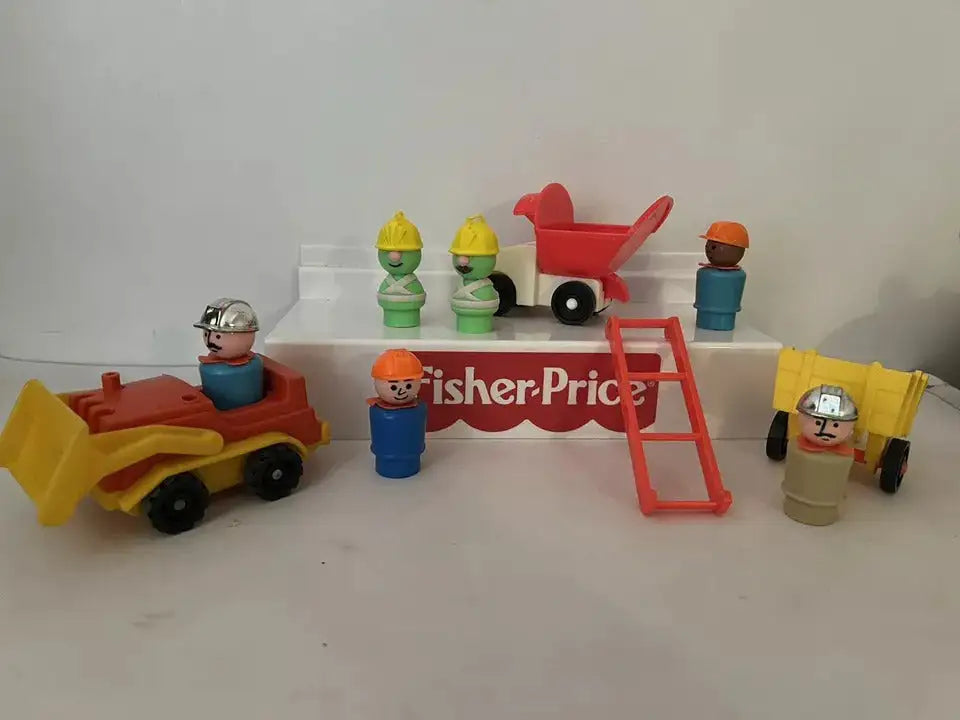 Doozers playset with multiple mini figures, red cart, yellow vehicle, and ladder