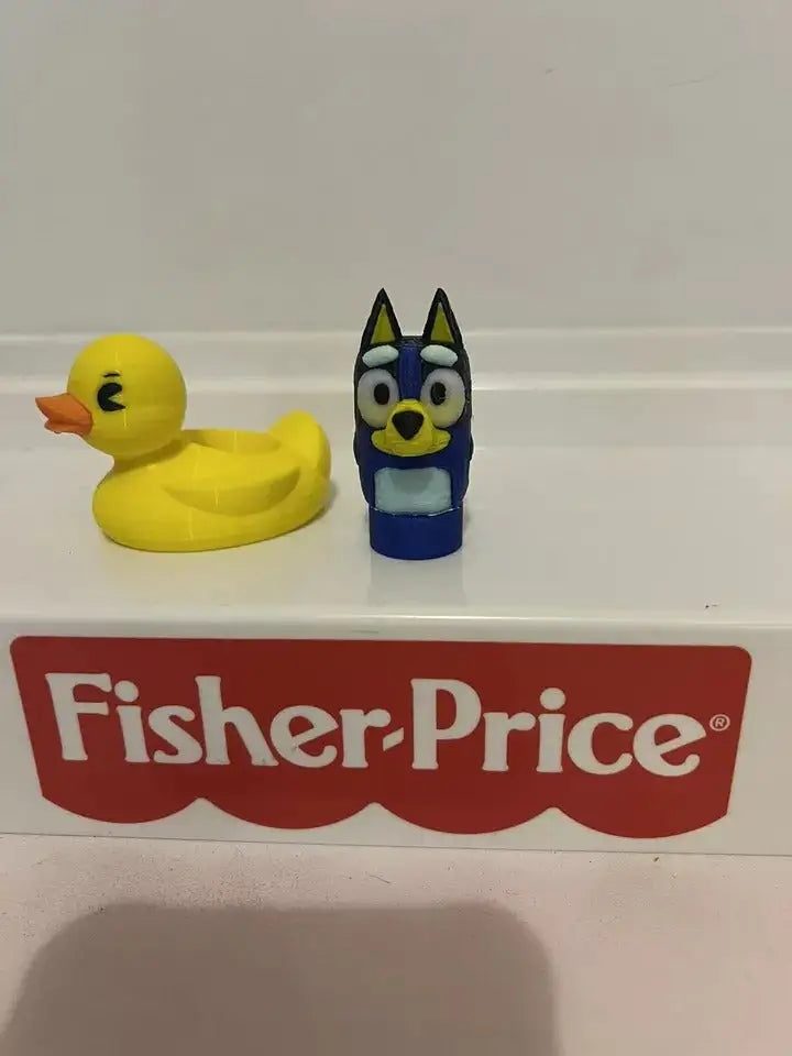 Bluey plush hand puppet and yellow duck toy, facing forward