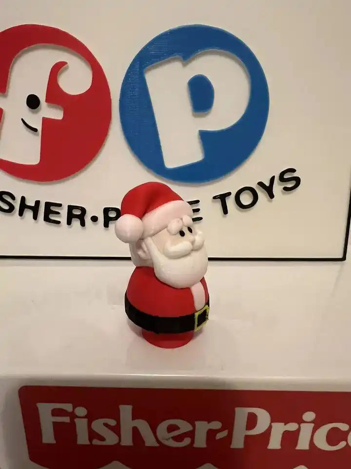 Santa holiday misfit toy figurine with red hat, white beard, and black belt