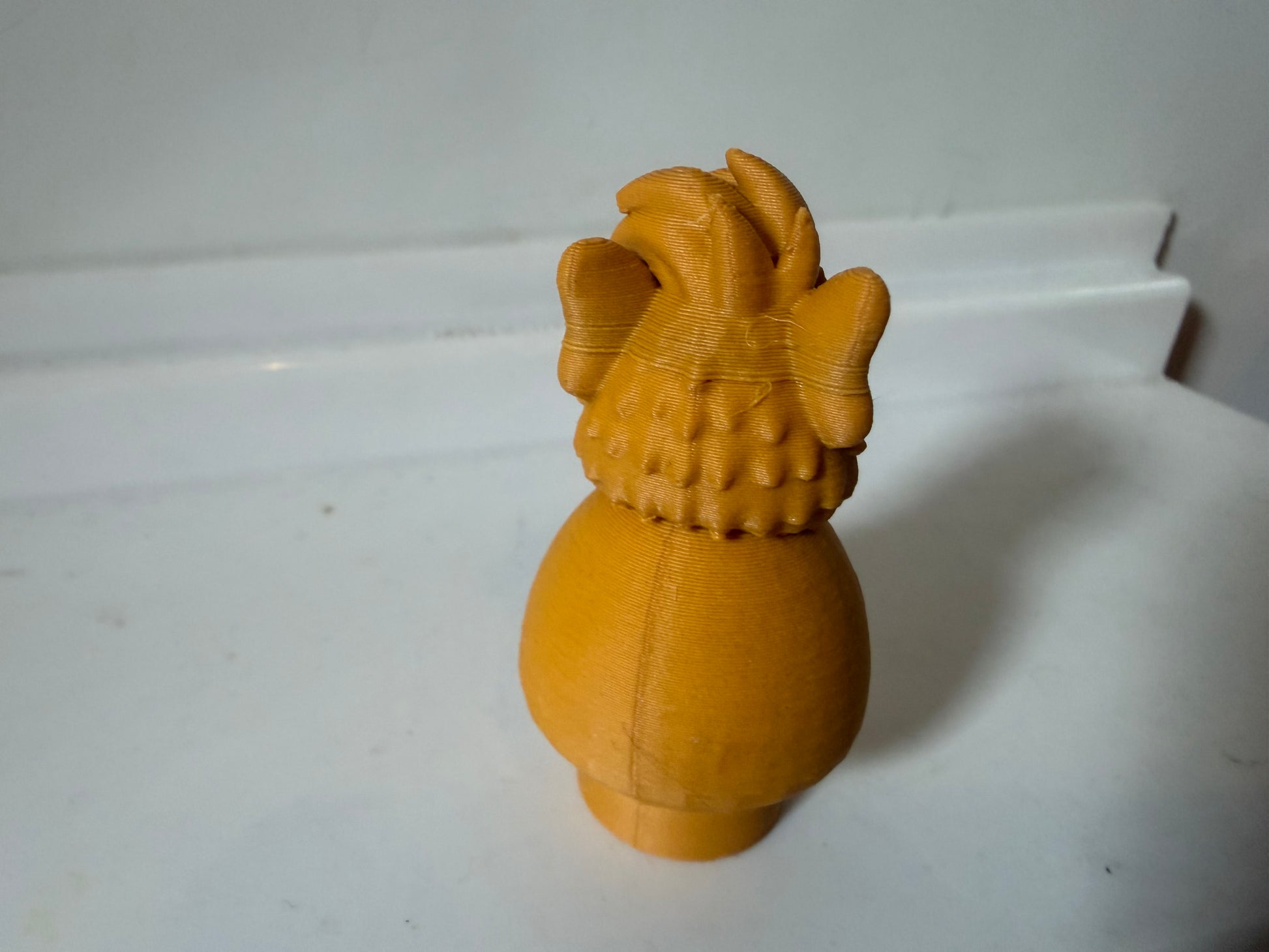 Vintage Alf figure toy in orange-brown, standing front view