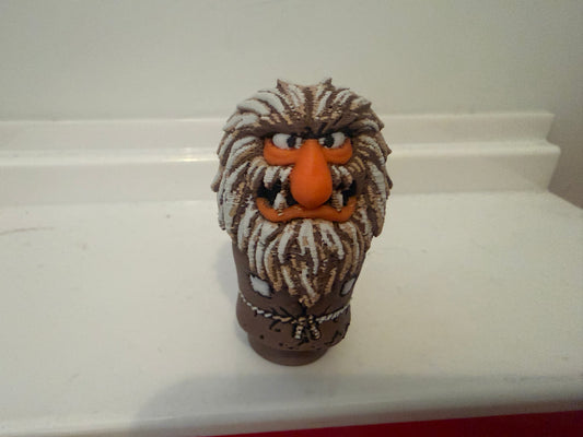 Sweetums vintage-style character figure front view with orange face and detailed fur texture