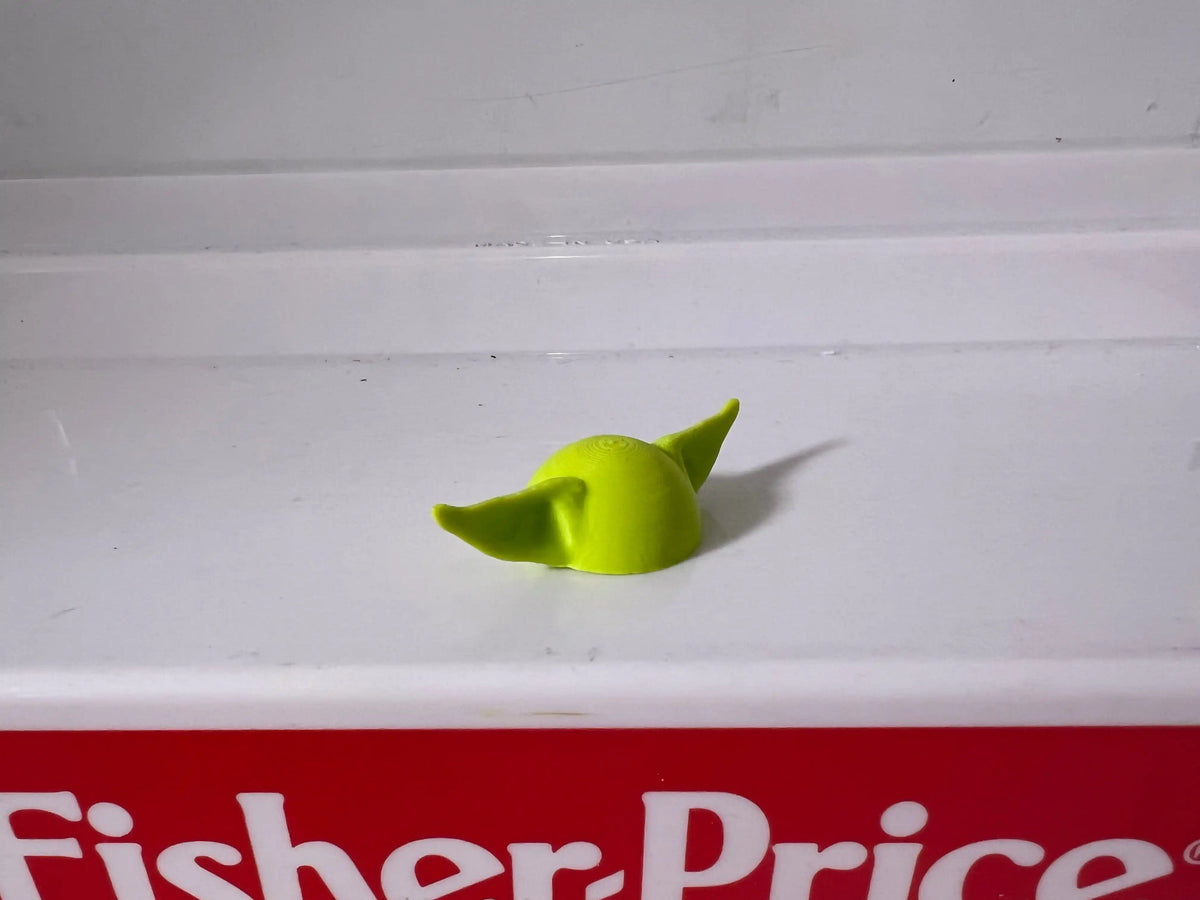 Lime-green hat with folded crown and pointed tip