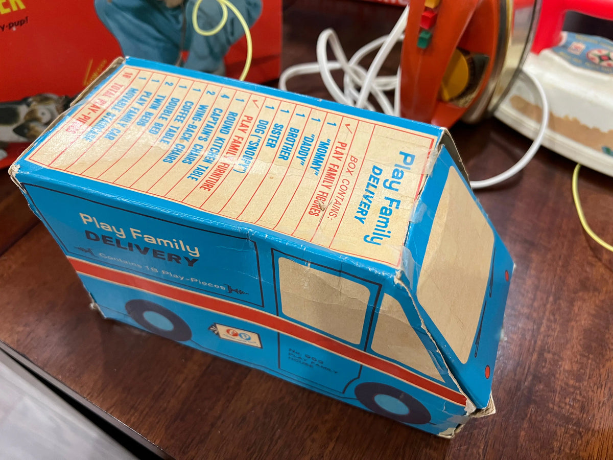 Blue play family delivery van toy box with red stripe and text on top