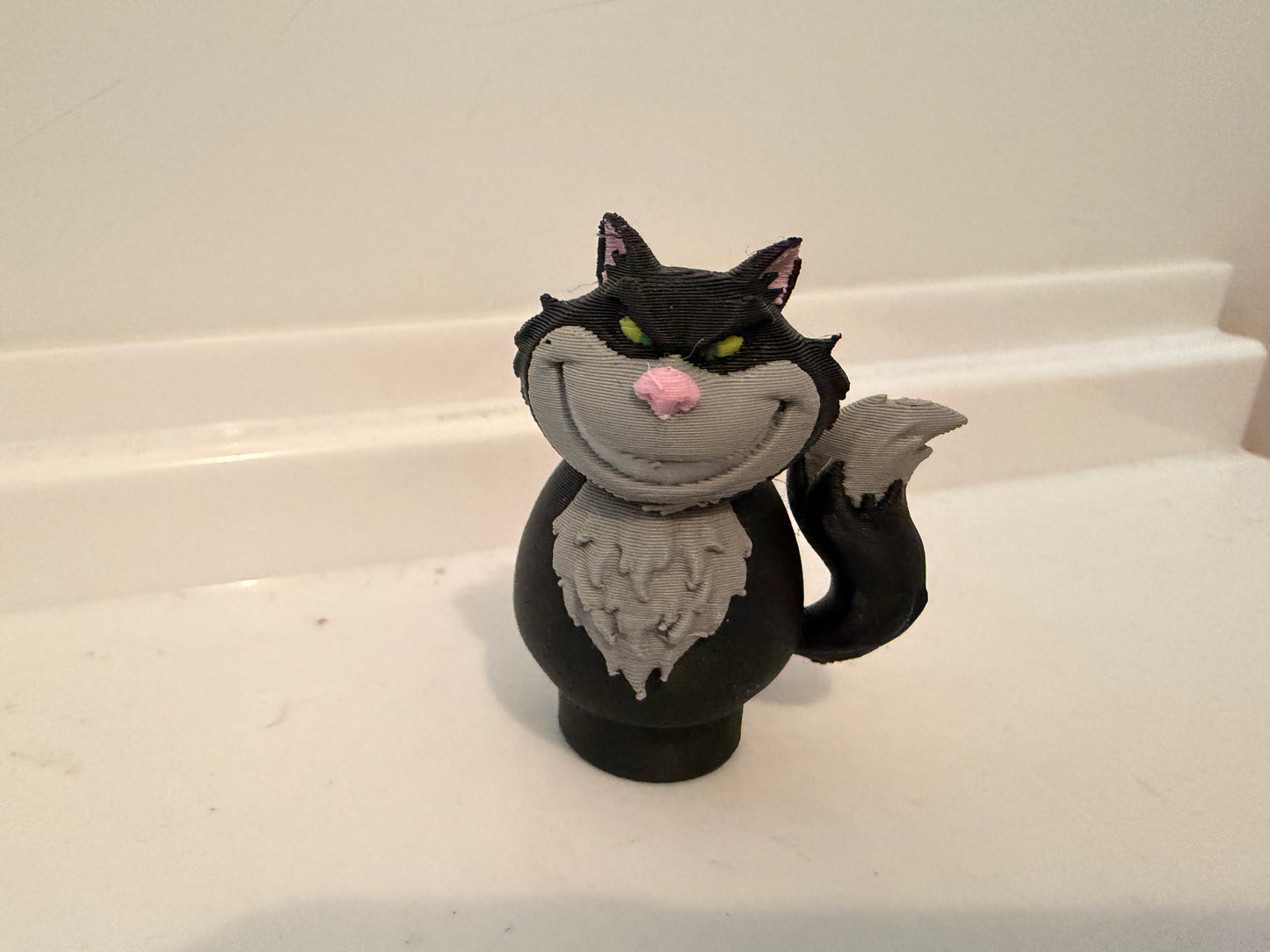 Lucifer black cat villain figure three-quarter view with gray collar and gray chest