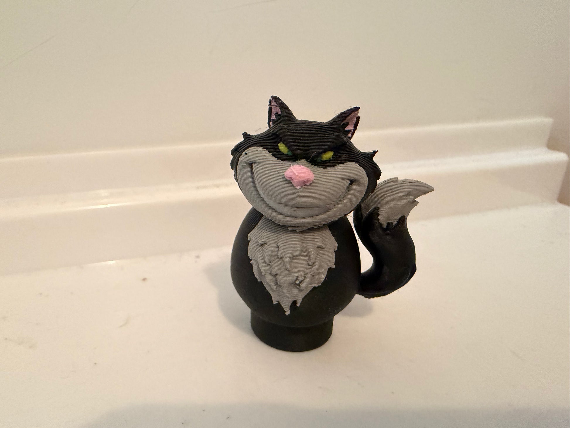 Lucifer black cat villain figure three-quarter view with gray collar and gray chest