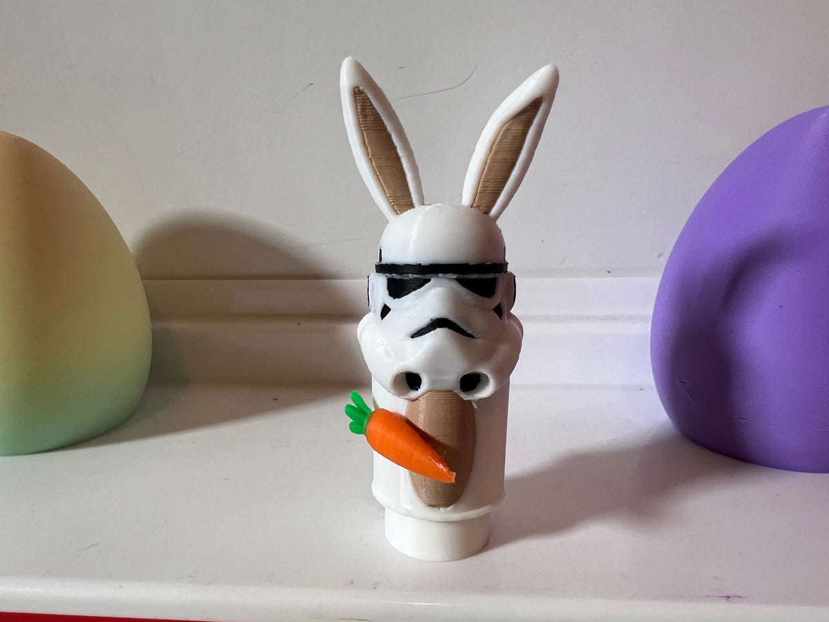 Storm Trooper bunny toy with black visor and orange carrot on chest