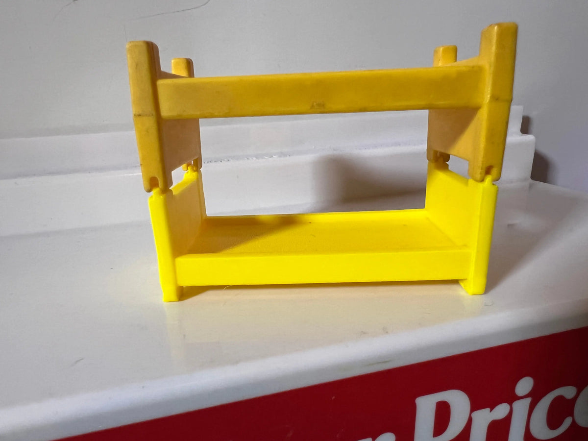 Yellow plastic bunk bed frame replacement with open front and side rails
