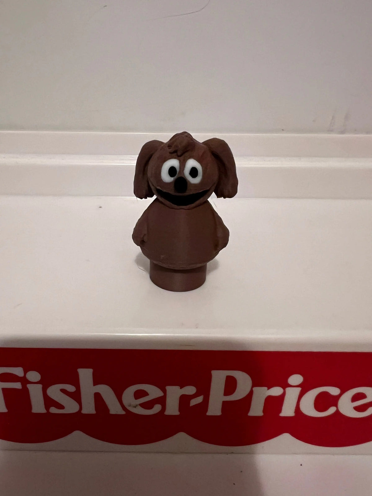 A custom 3D-printed Fisher-Price scale figure of Rowlf the Dog from the Muppets