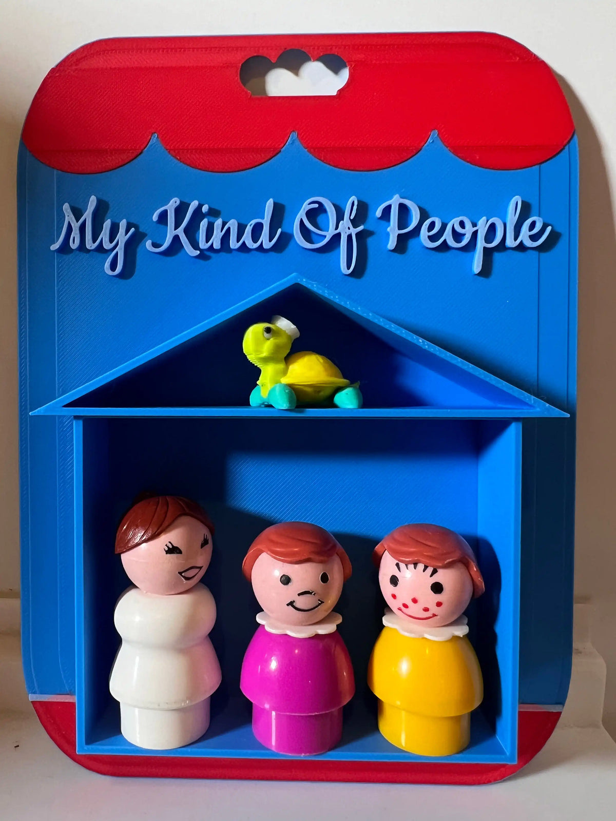 A blue and red custom Little People display card reads "My Kind Of People" above a turtle and three figures.