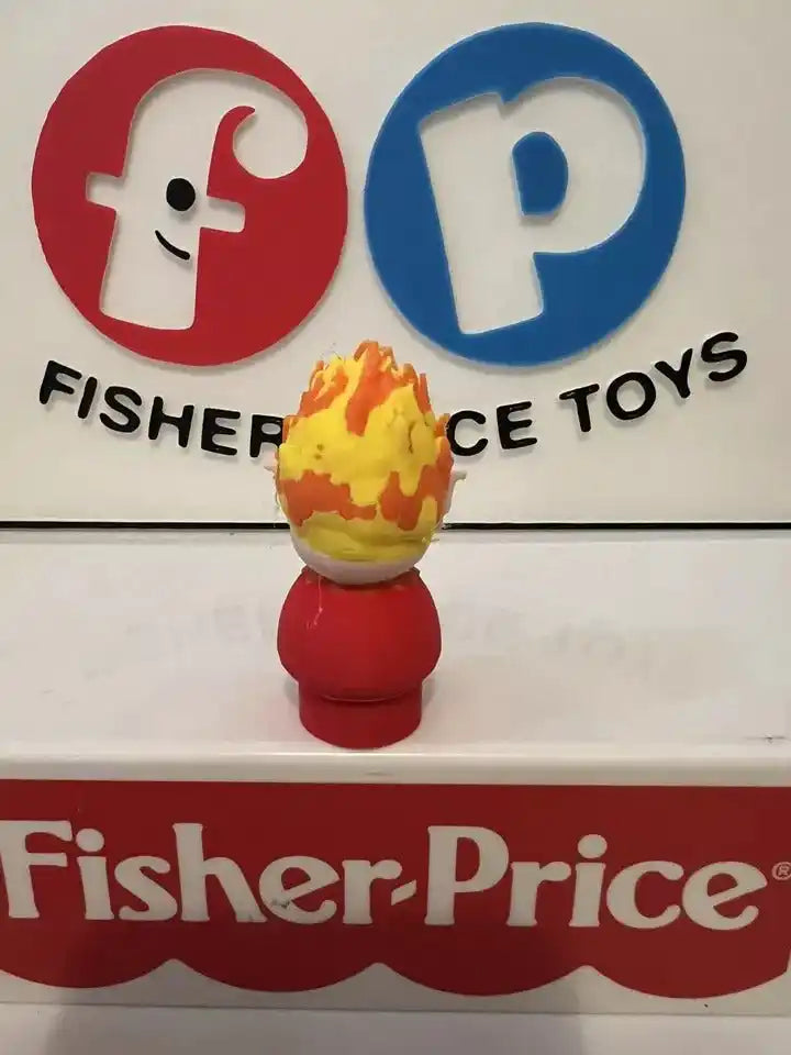 Small red and white holiday Heat Miser figure with orange flame hat