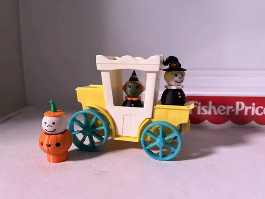 Custom Halloween Spooky Figures—two witch Little People figures in a yellow and white car, plus a pumpkin figure
