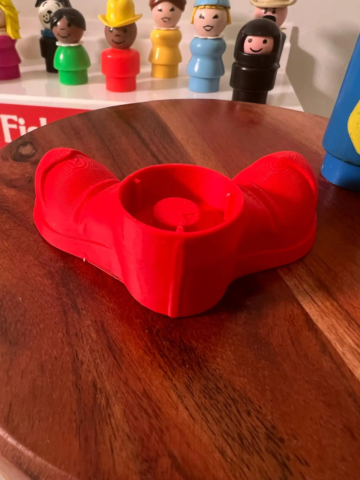 Fisher Price oversized red clown shoes, front view with circular opening