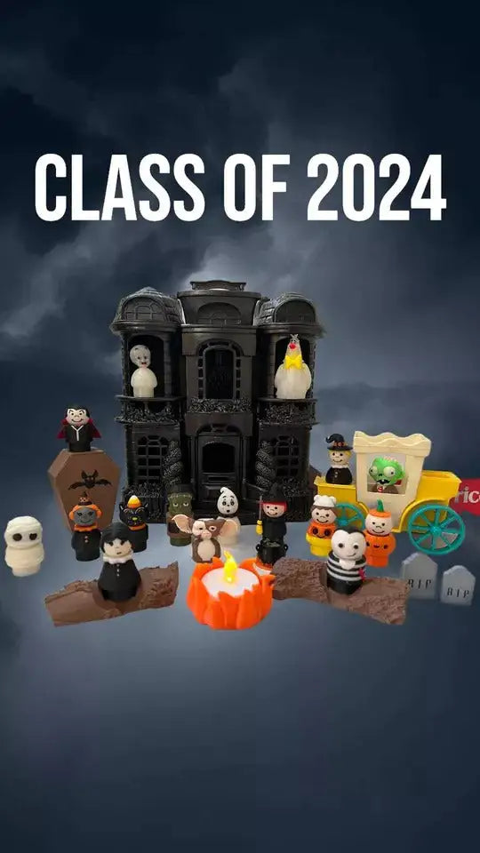 Casper the Friendly Ghost figurine among a group of small toy characters.