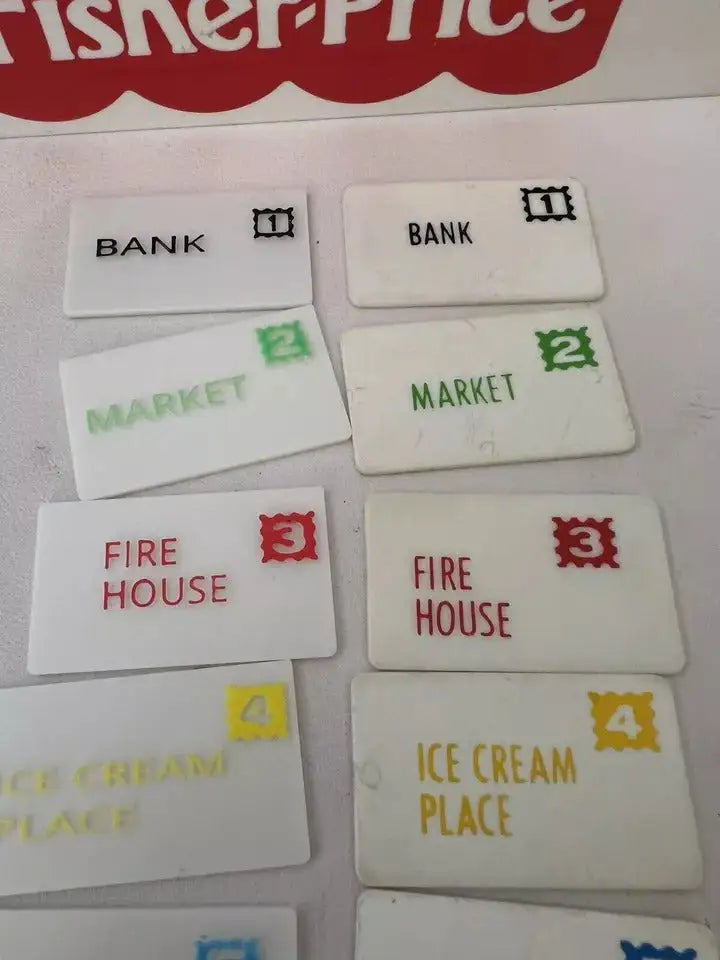 Fisher-Price replacement mail cards featuring Bank, Market, Fire House, and Ice Cream Place