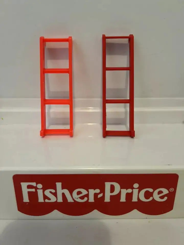 Orange and red plastic replacement ladder pieces with three rung steps