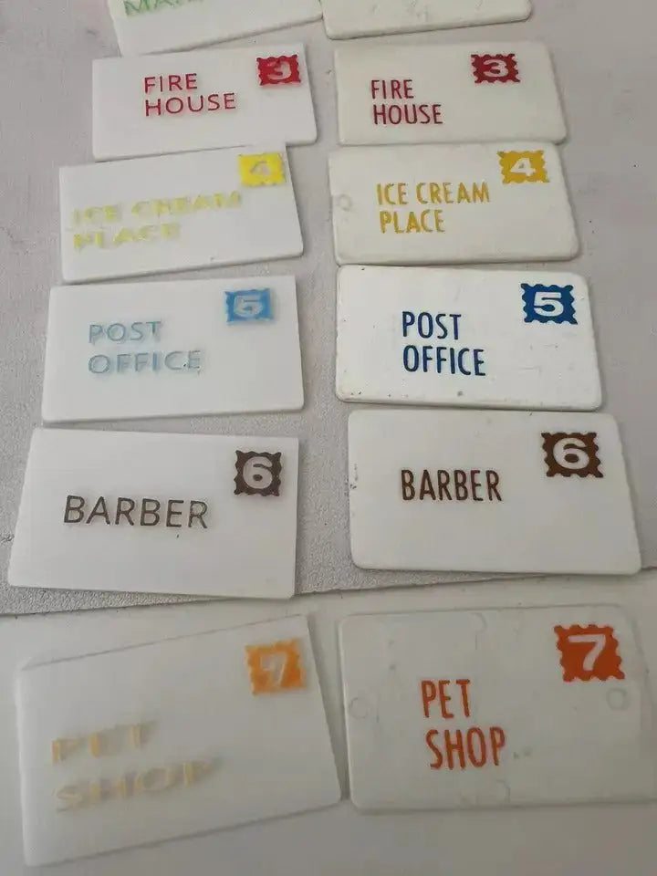 Vintage Fisher-Price replacement mail address cards showing Fire House, Ice Cream Place, Post Office, Barber