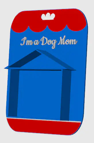 Red and blue display card reading “I'm a Dog Mom” with open house window