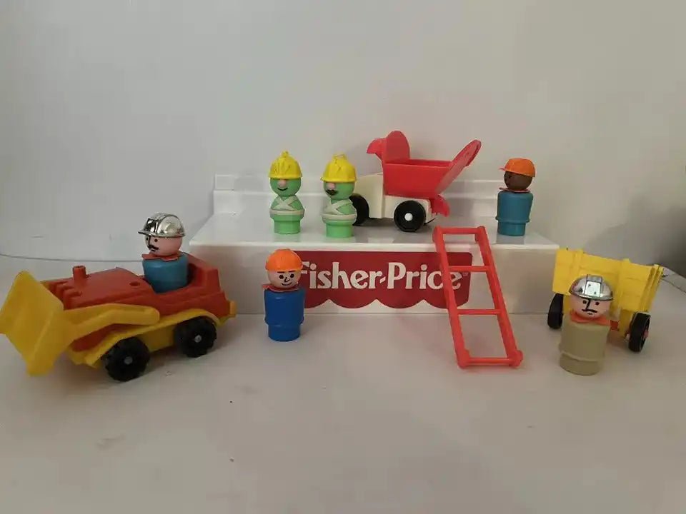 Toy set with green Doozer figures, red dump cart, ladder, and small accessories