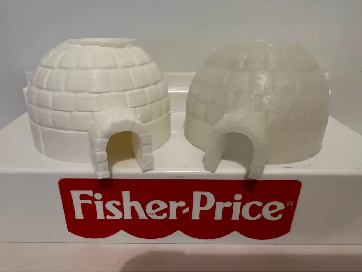 Snow white and translucent igloo-shaped holiday toys with arched doorways