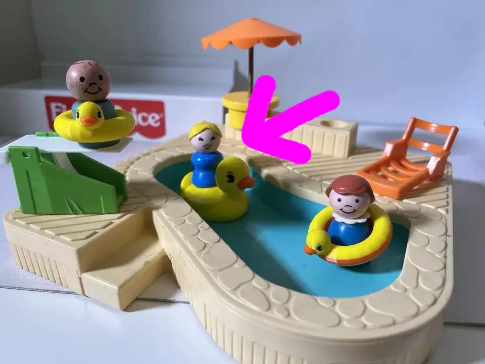 Yellow duck-shaped jumbo floatie with molded inner ring and orange beak