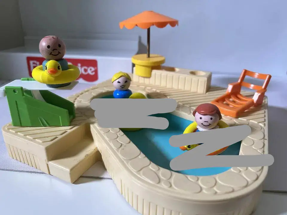 Mini duck floatie toy with yellow duck, kids, blue pool and orange slide