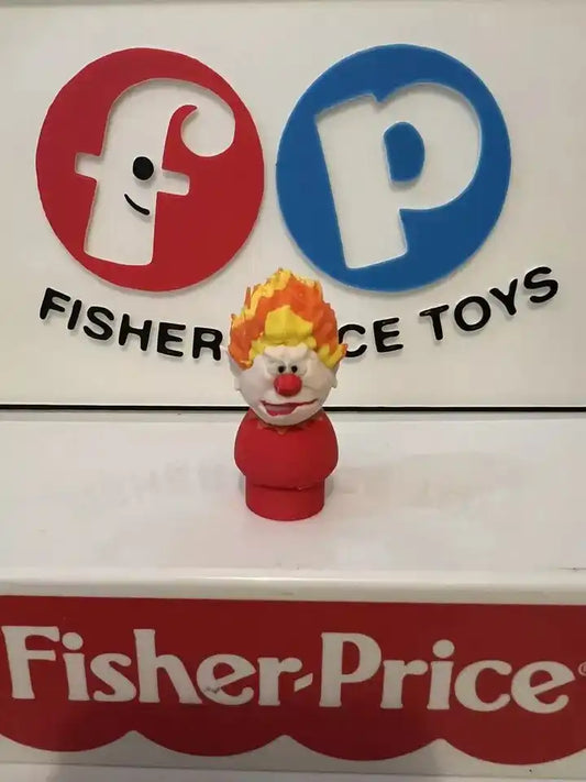 Red and white holiday Heat Miser figure with orange flame hat