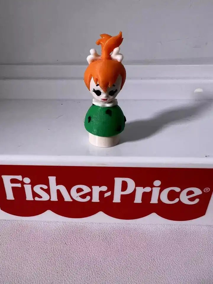 Custom Fisher-Price Little People-style "Flintstones PEBBLES" figure with orange hair and a green spotted outfit.