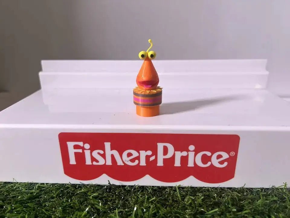 Bug-themed toy figure on white plastic steps with red Fisher-Price logo across front