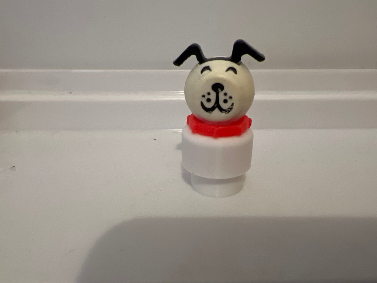 White Lucky/Fido dog figure with red collar and black ears