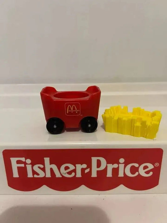 Vintage Fisher-Price red fry car adapter with black wheels and yellow fries